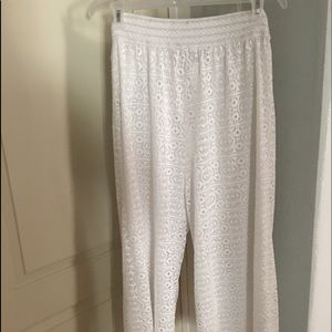 White pants/swimsuit cover